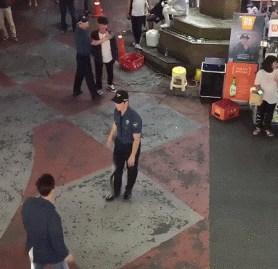 Police officers in South Korea calmly control a violent situation using martial arts