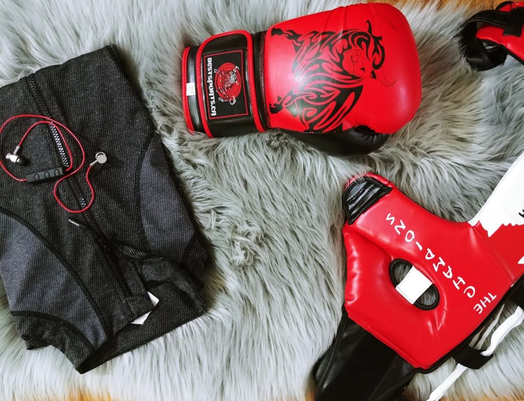 gloves and headgear laid out ready for martial arts classes
